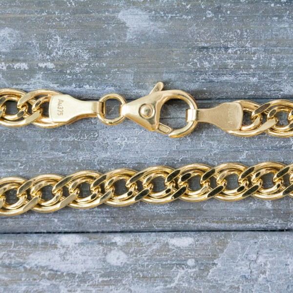 Goldkette als Zwillingspanzerkette in Gelbgold 375 / 9 Karat, 45 cm lang, 4.8 mm breit, Gewicht ca. 6.6 g.