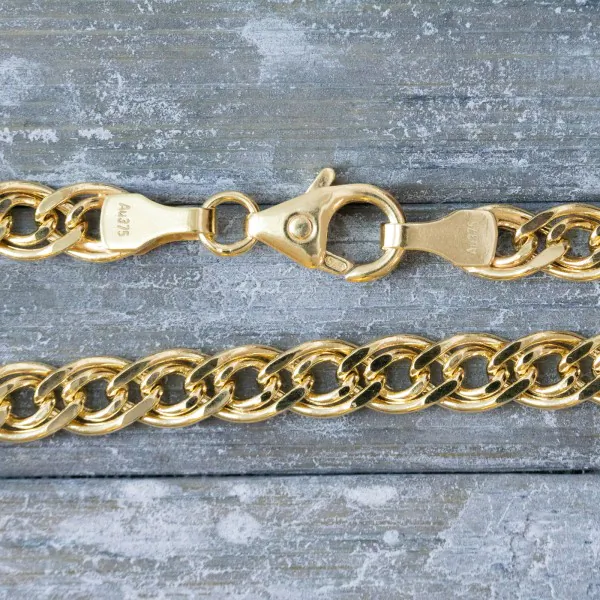 Goldkette als Zwillingspanzerkette in Gelbgold 375 / 9 Karat, 60 cm lang, 4.8 mm Breit, Gewicht ca. 8,5 g.