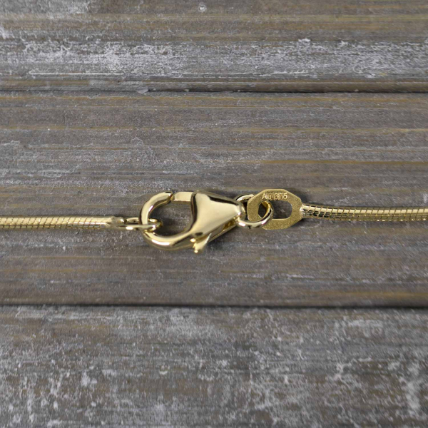 Goldkette als Schlangenkette in Gelbgold 375 / 9K, 42 cm lang, 1,1 mm breit, Gewicht ca. 3.9 g.