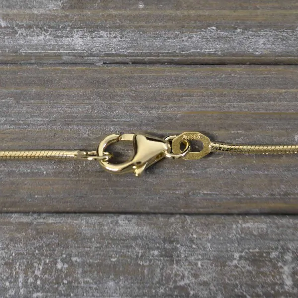 Goldkette als Schlangenkette in Gelbgold 375 / 9K, 45 cm lang, 1,1 mm breit, Gewicht ca. 4.2 g.