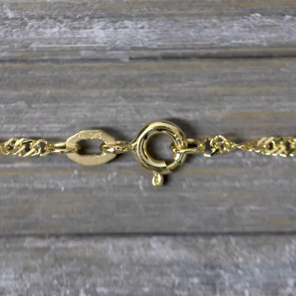 Goldkette als Singapurkette in Gelbgold 375 / 9 Karat, 95 cm lang, 1.8 mm breit, Gewicht ca. 5.2 g.