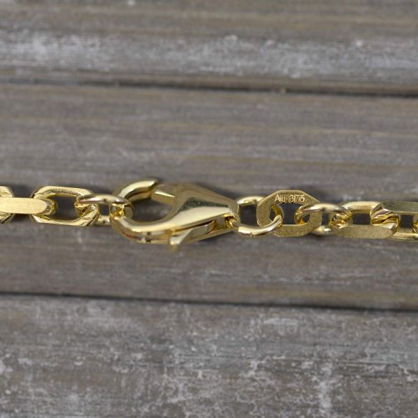 Goldkette als Ankerkette diamantiert in Gelbgold 375 / 9K, 50 cm lang, 3 mm breit, Gewicht ca. 20 g.
