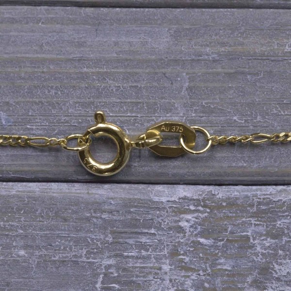 Goldkette als Figarokette diamantiert in Gelbgold 375 / 9K, 42 cm lang, 1,1 mm breit, Gewicht ca. 1.2 g.