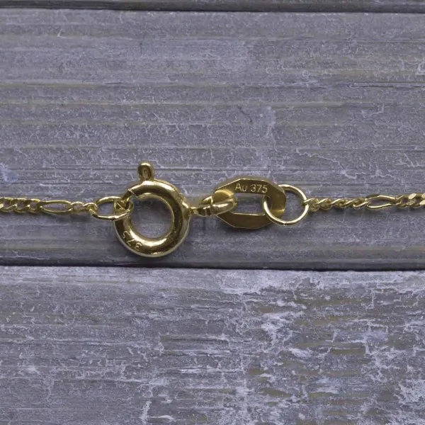 Goldkette als Figarokette diamantiert in Gelbgold 375 / 9K, 34 cm lang, 1,1 mm breit, Gewicht ca. 1 g.