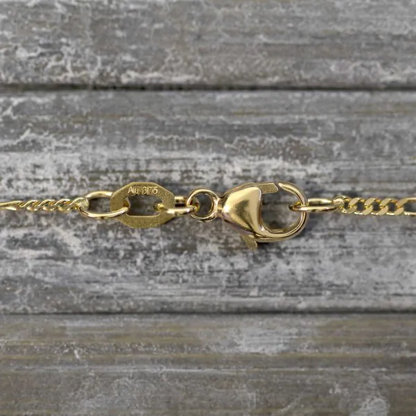 Goldkette als Figarokette diamantiert in Gelbgold 375 / 9K, 40 cm lang, 1,5 mm breit, Gewicht ca. 2 g.