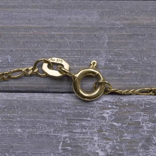 Goldkette als Figarokette diamantiert in Gelbgold 375 / 9K, 36 cm lang, 1,5 mm breit, Gewicht ca. 1.7 g.