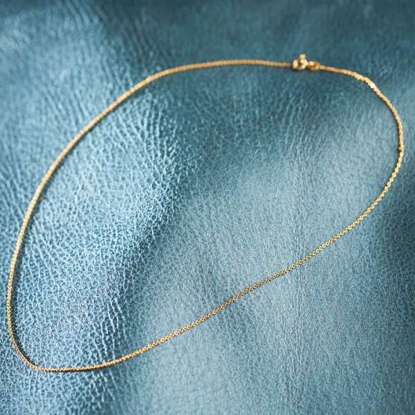 Goldkette als Ankerkette flach in Gelbgold 585 / 14K, 36 cm lang, 1,2 mm breit, Gewicht ca. 1.4 g.