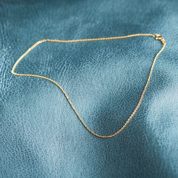 Goldkette als Ankerkette diamantiert in Gelbgold 585 / 14K, 42 cm lang, 1,3 mm breit, Gewicht ca. 2.3 g.