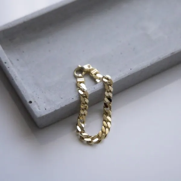 Armband als Panzerkette flach in Gelbgold 585 / 14K, 23 cm lang, 4,1 mm breit, Gewicht ca. 9.8 g.