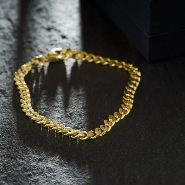 Armband als Panzerkette flach in Gelbgold 333 / 8K, 19 cm lang, 4.7 mm breit, Gewicht ca. 9.8 g.