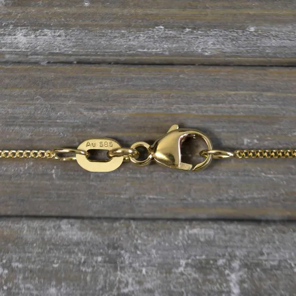 Goldkette als Panzerkette flach in Gelbgold 585 / 14K, 36 cm lang, 1,1 mm breit, Gewicht ca. 1.5 g.