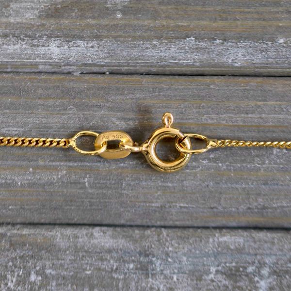 Goldkette als Panzerkette flach in Gelbgold 585 / 14K, 50 cm lang, 1,1 mm breit, Gewicht ca. 1.9 g.
