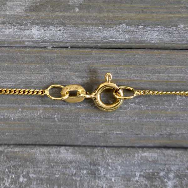 Goldkette als Panzerkette flach in Gelbgold 585 / 14 Karat, 70 cm lang, 1.1 mm breit, Gewicht ca. 2,6 g.