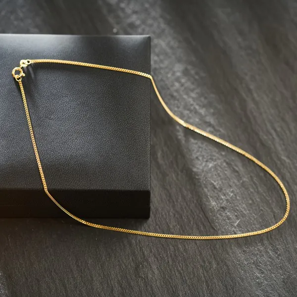 Goldkette als Panzerkette flach in Gelbgold 585 / 14K, 80 cm lang, 1,6 mm breit, Gewicht ca. 6.6 g.