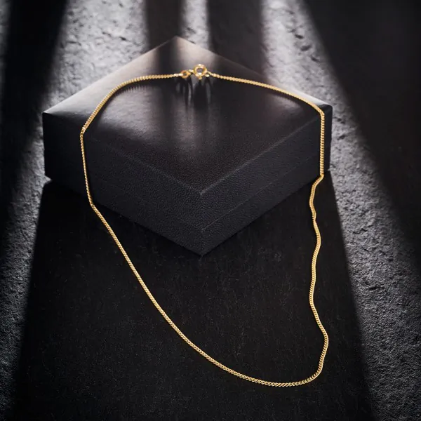 Goldkette als Panzerkette flach in Gelbgold 375 / 9K, 40 cm lang, 1,7 mm breit, Gewicht ca. 3.5 g.