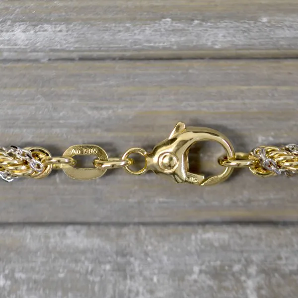 Armband als Kordelkette hohl in Bicolor Gelbgold / Weißgold 585 / 14K, 18 cm lang, 3.3 mm breit, Gewicht ca. 5.2 g.