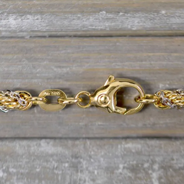 Goldkette als Kordelkette hohl in Bicolor Gelbgold / Weißgold 585 / 14K, 70 cm lang, 3,3 mm breit, Gewicht ca. 18.7 g.
