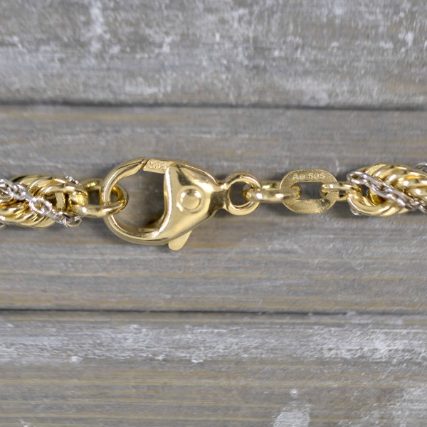 Armband als Kordelkette hohl in Bicolor Gelbgold / Weißgold 585 / 14K, 18 cm lang, 4.4 mm breit, Gewicht ca. 7.6 g.