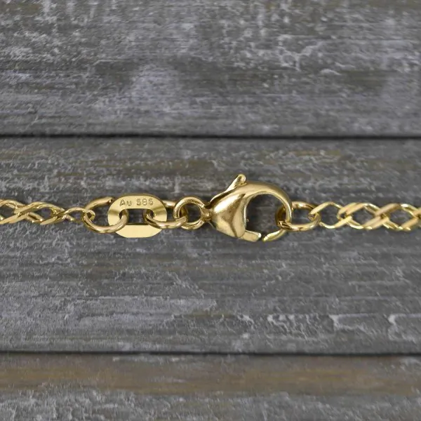 Goldkette als Zwillingspanzerkette in Gelbgold 585 / 14K, 42 cm lang, 2,1 mm breit, Gewicht ca. 2.8 g.