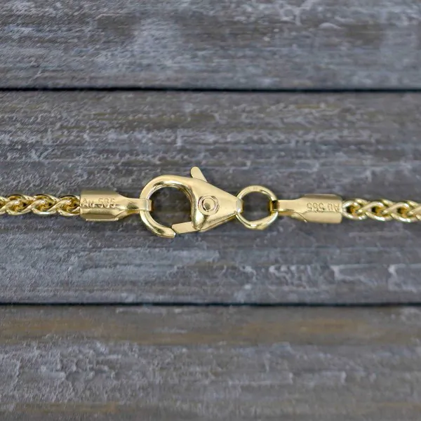 Armband als Zopfkette in Gelbgold 585 / 14K, 18,5 cm lang, 1,7 mm breit, Gewicht ca. 2.2 g.