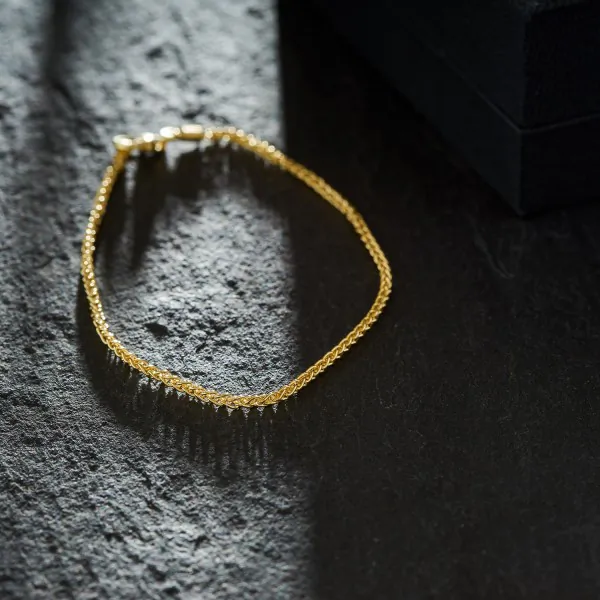 Armband als Zopfkette in Gelbgold 333 / 8 K, 18 cm lang, 1,7mm breit, Gewicht ca. 1.8 g.