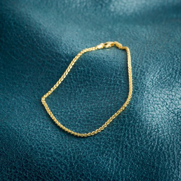 Armband als Zopfkette in Gelbgold 333 / 8 K, 18 cm lang, 1,7mm breit, Gewicht ca. 1.8 g.
