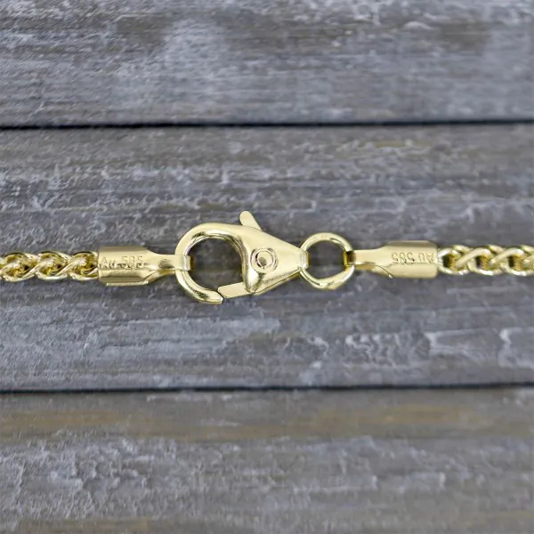 Armband als Zopfkette in Gelbgold 585 / 14 K, 20 cm lang, 2,5mm breit, Gewicht ca. 5 g.