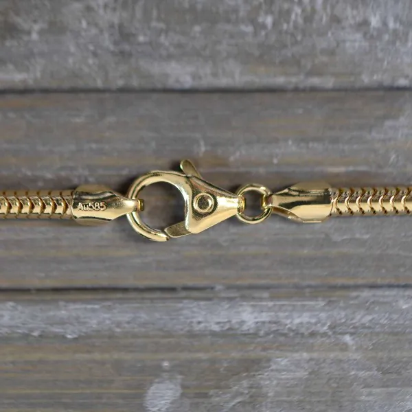 Goldkette als Schlangenkette in Gelbgold 585 / 14K, 38 cm lang, 2,4 mm breit, Gewicht ca. 11 g.