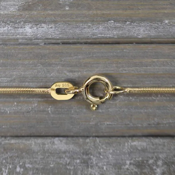 Goldkette als Schlangenkette in Gelbgold 585 / 14K, 55 cm lang, 1,1 mm breit, Gewicht ca. 5.9 g.