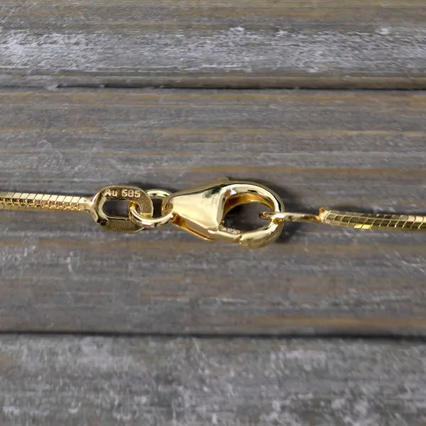 Goldkette als Schlangenkette diamantiert in Gelbgold 585 / 14K, 55 cm lang, 1 mm breit, Gewicht ca. 6.5 g.