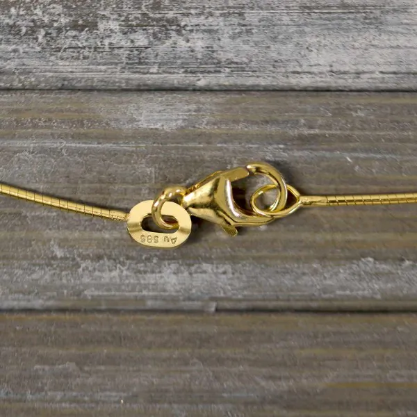Goldkette als Tondakette in Gelbgold 585 / 14K, 36 cm lang, 0,8 mm breit, Gewicht ca. 2.6 g.