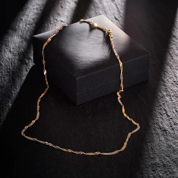 Goldkette als Singapurkette in Bicolor Gelbgold / Weißgold 750 / 18K, 60 cm lang, 2,4 mm breit, Gewicht ca. 7.5 g.