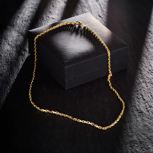 Goldkette als Ankerkette diamantiert in Gelbgold 333 / 8K, 50 cm lang, 2,5 mm breit, Gewicht ca. 12.5 g.