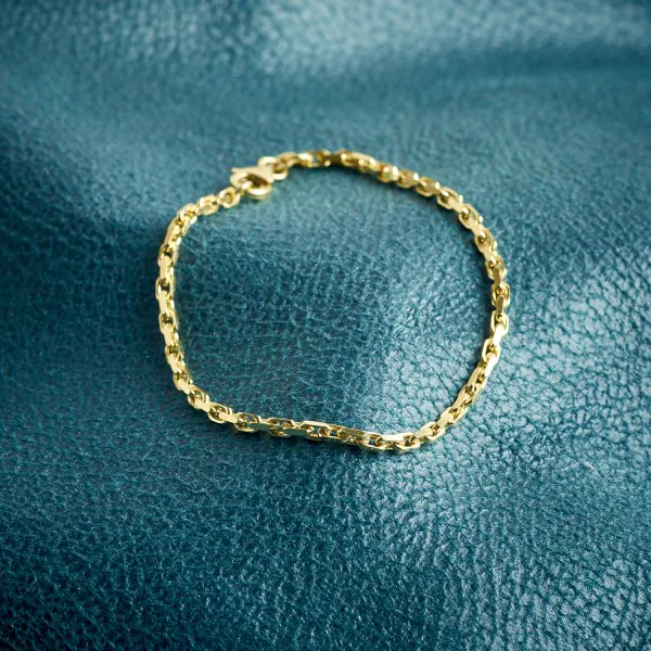 Armband als Ankerkette diamantiert in Gelbgold 585 / 14K, 21 cm lang, 2,5 mm breit, Gewicht ca. 7.3 g.