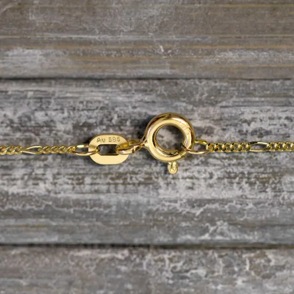 Goldkette als Figarokette diamantiert in Gelbgold 585 / 14K, 45 cm lang, 1,1 mm breit, Gewicht ca. 1.5 g.