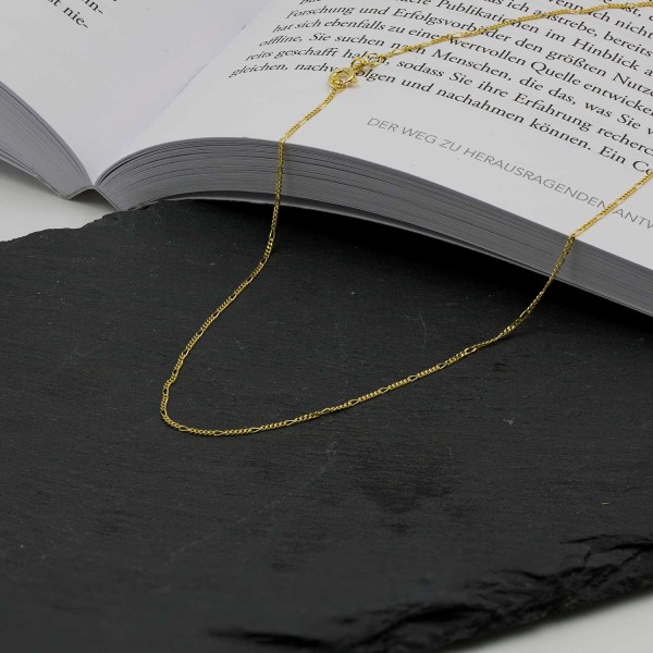 Goldkette als Figarokette diamantiert in Gelbgold 585 / 14K, 80 cm lang, 1,1 mm breit, Gewicht ca. 2.7 g.