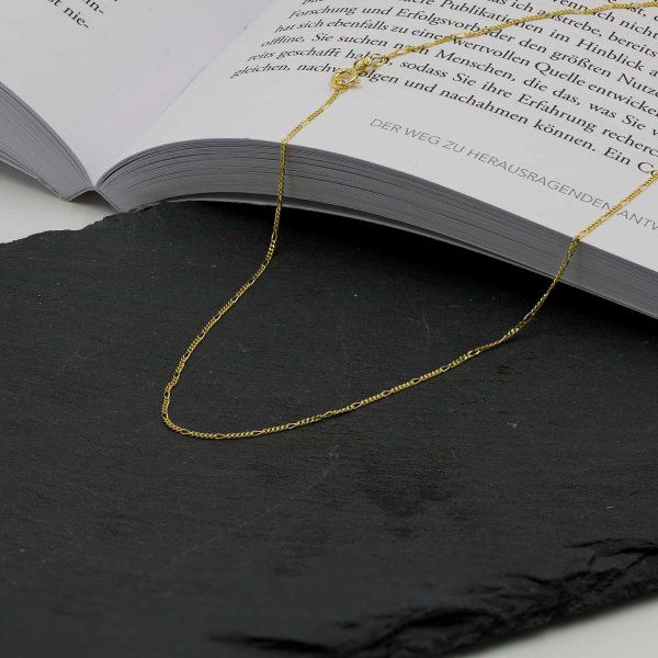 Goldkette als Figarokette diamantiert in Gelbgold 585 / 14K, 45 cm lang, 1,1 mm breit, Gewicht ca. 1.5 g.