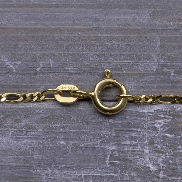 Goldkette als Figarokette diamantiert in Gelbgold 585 / 14K, 60 cm lang, 1,5 mm breit, Gewicht ca. 3.2 g.