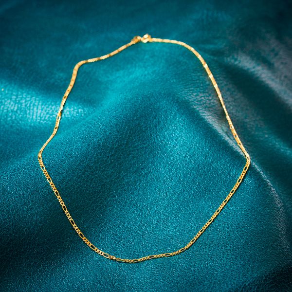Goldkette als Figarokette diamantiert in Gelbgold 585 / 14K, 60 cm lang, 2,2 mm breit, Gewicht ca. 6.6 g.