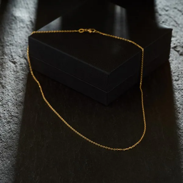 Goldkette als Ankerkette diamantiert in Gelbgold 750 / 18K, 45 cm lang, 1,3 mm breit, Gewicht ca. 3.4 g.