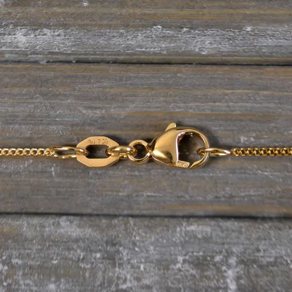 Goldkette als Panzerkette flach in Gelbgold 750 / 18K, 36 cm lang, 1,1 mm breit, Gewicht ca. 1.9 g.