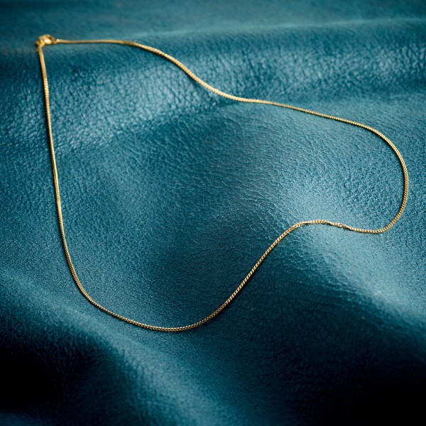 Goldkette als Panzerkette flach in Gelbgold 585 / 14K, 50 cm lang, 1,4 mm breit, Gewicht ca. 3.4 g.