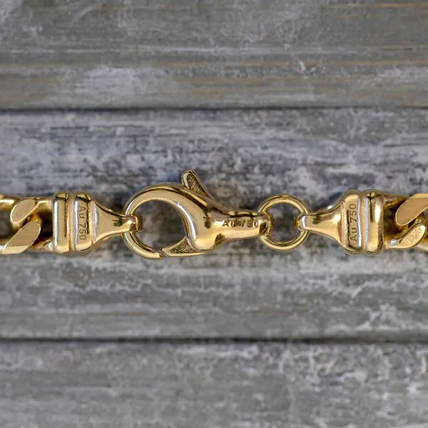 Goldkette als Figarokette diamantiert in Gelbgold 750 / 18K, 70 cm lang, 4,3 mm breit, Gewicht ca. 36.6 g.