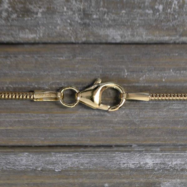 Goldkette als Schlangenkette in Gelbgold 750 / 18K, 42 cm lang, 1,2 mm breit, Gewicht ca. 4.5 g.