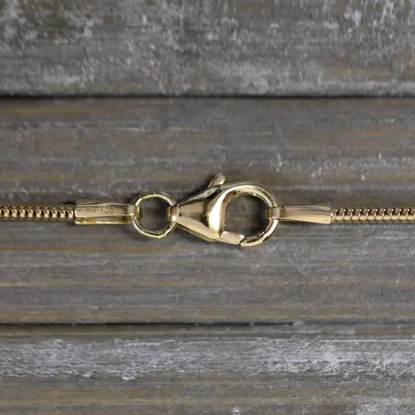 Goldkette als Schlangenkette in Gelbgold 750 / 18K, 42 cm lang, 1,2 mm breit, Gewicht ca. 4.5 g.