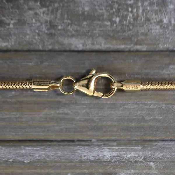 Goldkette als Schlangenkette in Gelbgold 750 / 18K, 38 cm lang, 1,6 mm breit, Gewicht ca. 5.7 g.