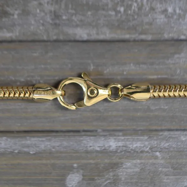 Goldkette als Schlangenkette in Gelbgold 750 / 18K, 36 cm lang, 2,4 mm breit, Gewicht ca. 13.3 g.