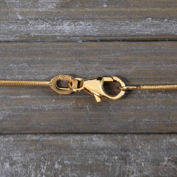 Goldkette als Schlangenkette in Gelbgold 750 / 18K, 40 cm lang, 0,9 mm breit, Gewicht ca. 4 g.
