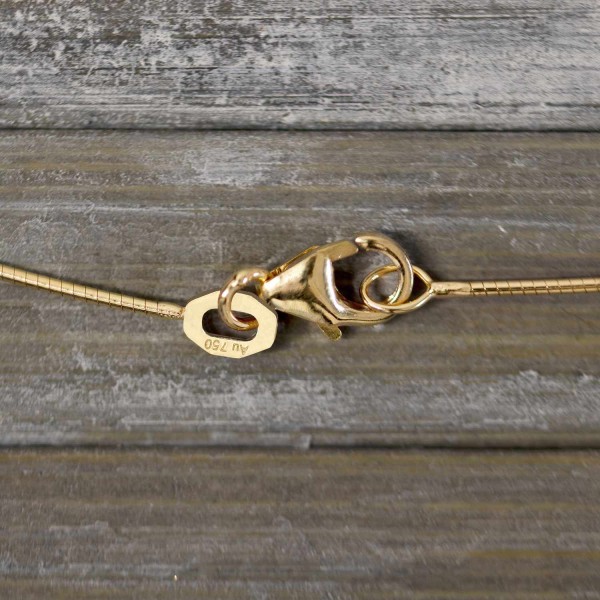 Goldkette als Tondakette in Gelbgold 750 / 18K, 36 cm lang, 0,8 mm breit, Gewicht ca. 2.9 g.
