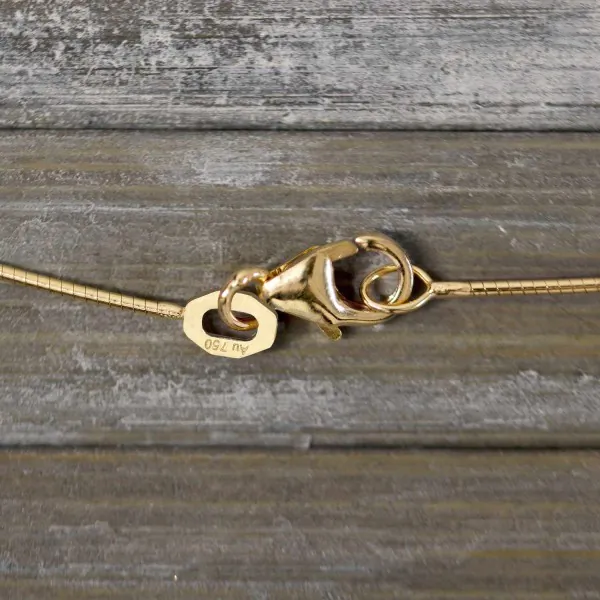 Goldkette als Tondakette in Gelbgold 750 / 18K, 55 cm lang, 0,8 mm breit, Gewicht ca. 4.4 g.